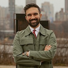 Zohran Mamdani arms crossed